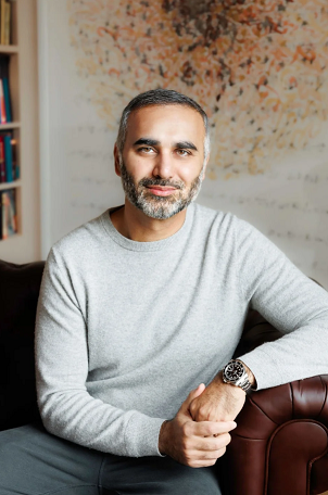 Portrait of author Hafeez Lakhani.