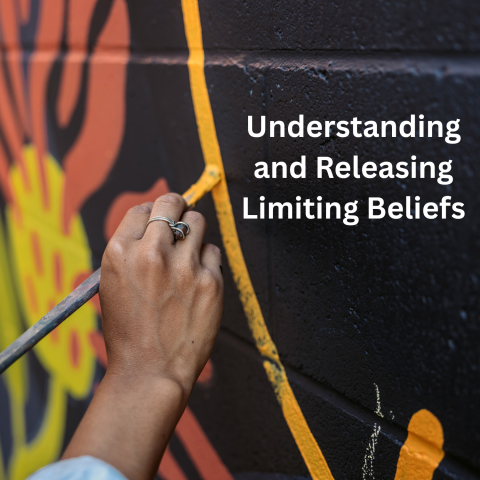a hand painting a yellow line with text that reads "Understanding and Releasing Limiting Beliefs"
