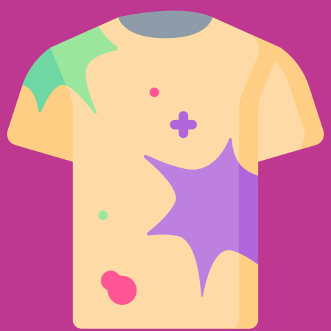 A light peach t-shirt with colorful splotches and shapes in purple, green, pink, and light blue.