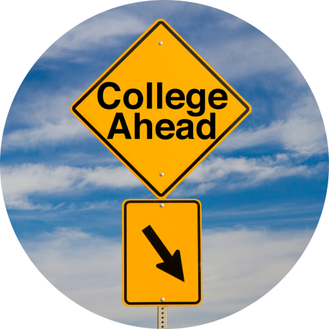 A yellow diamond-shaped sign reads 'College Ahead' with a smaller yellow square sign below it indicating a diagonal arrow pointing down and to the left.